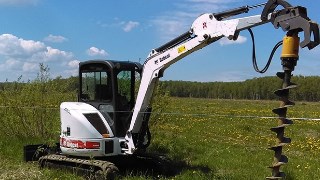 Аренда экскаватора погрузчика с ямобуром в Советская Гавань цена от 1578 руб